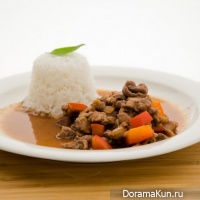 Pork stewed with prunes and cinnamon